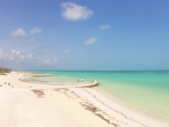 Land for sale on Holbox Island – view of the pier and the sea in the background