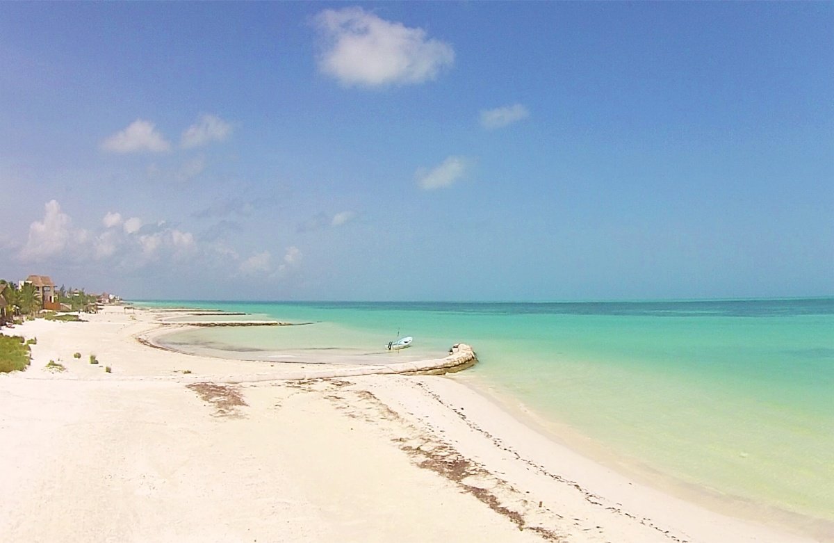 Land for sale on Holbox Island – view of the pier and the sea in the background