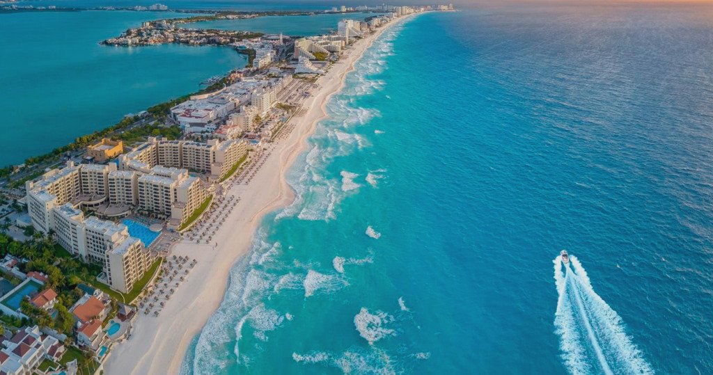 Which area should I choose to invest in Cancun?